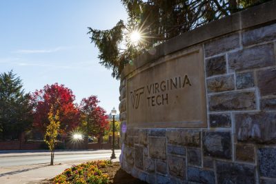 Fall colors sourrding teh Virginia Tech sign on Alumni Mall.